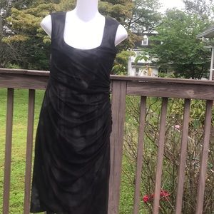 Ruched Black Party Dress with light underlay.